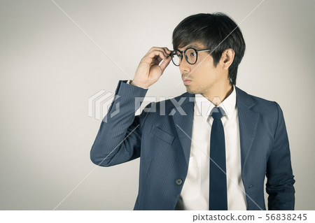 Young Asian Portrait Businessman Touch Eyeglasses Young Asian Portrait Businessman Touch Eyeglasses 56838245