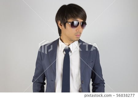 Young Asian Portrait Businessman in Navy Blue Suit Young Asian Portrait Businessman in Navy Blue Suit 56838277
