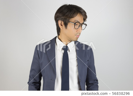 Young Asian Portrait Businessman in Navy Blue Suit Young Asian Portrait Businessman in Navy Blue Suit 56838296