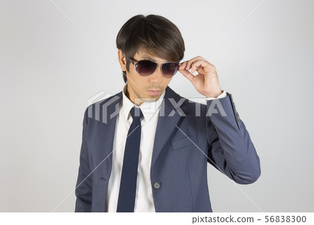 Young Asian Portrait Businessman in Navy Blue Suit Young Asian Portrait Businessman in Navy Blue Suit 56838300