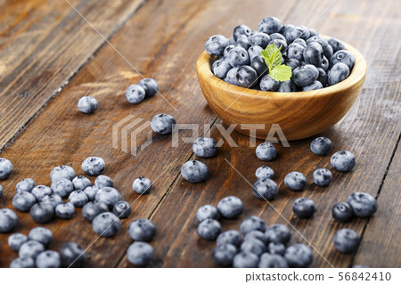 ripe blueberries in a plate 56842410
