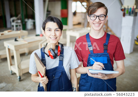 Two Young Workers at Factory 56843223