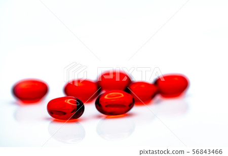 Red soft gel capsule pills isolated on white 56843466