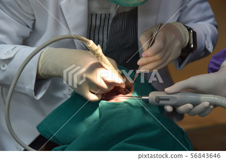 Dental care check up, Dentist examining. Dental care check up, Dentist examining. 56843646