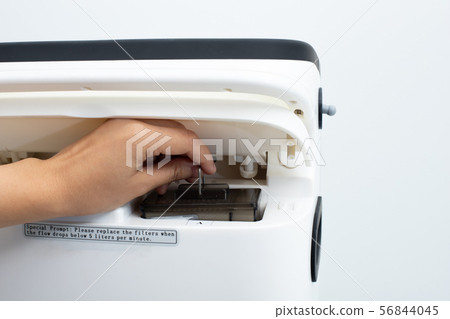 Medical Device Individual portable oxygen cylinder to put gas for patients with respiratory disorders, Hand changing filter of machine 56844045