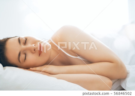 young woman is sleeping young woman is sleeping 56846502