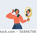 Young woman looking herself reflection in mirror 56846706