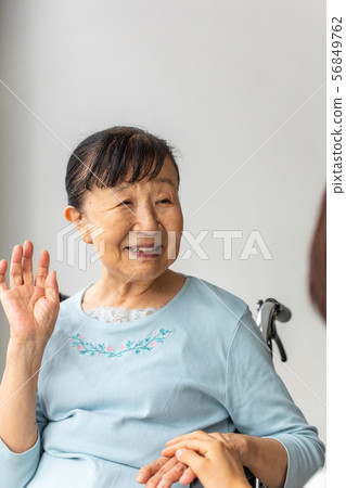 Senior women and caregivers Senior women and caregivers 56849762