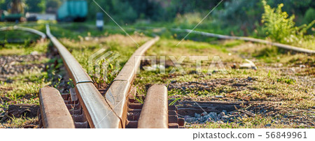 Railway sleepers and rails close-up 56849961