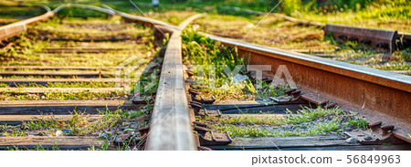 Railway sleepers and rails close-up 56849963