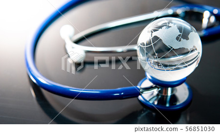 World globe crystal glass on stethoscope World globe crystal glass on stethoscope 56851030