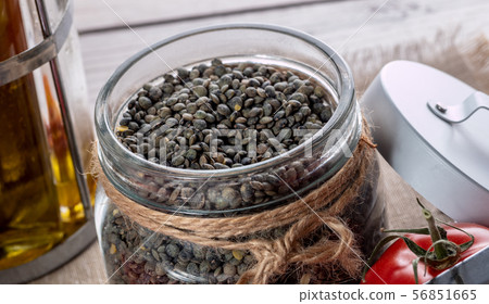 close-up of lentils in a glass jar close-up of lentils in a glass jar 56851665