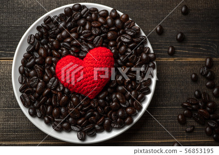red heart on a lot of roasted coffee beans 56853195