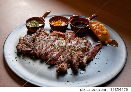 ribeye beef steak with pineapple and dip sauce ribeye beef steak with pineapple and dip sauce 56854476