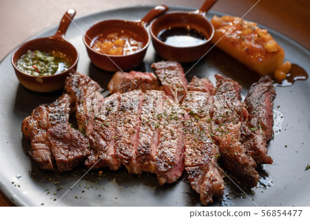 closeup medium rare beef steak with grill closeup medium rare beef steak with grill 56854477