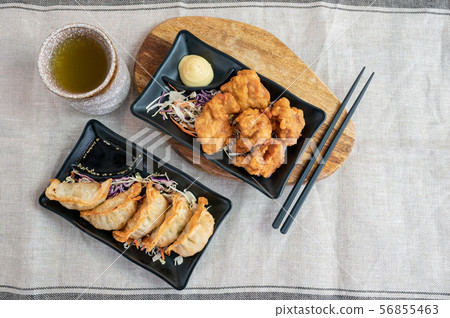 Karaage chicken deep fried with Gyoza dumplings 56855463