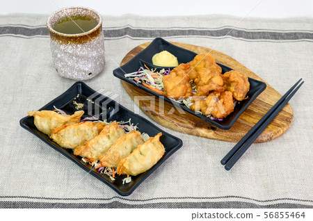 Karaage chicken deep fried with Gyoza dumplings 56855464