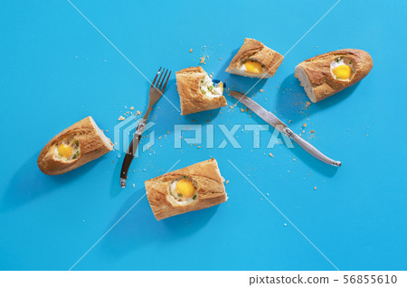 Eggs in bread loaf as breakfast. Eating food 56855610