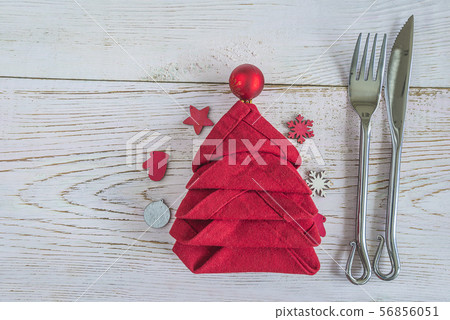 Festive place setting for christmas dinner 56856051
