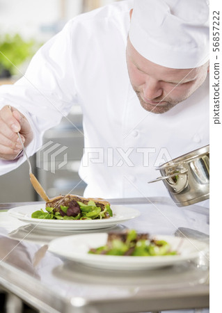 Professional chef prepare meat dish at restaurant Professional chef prepare meat dish at restaurant 56857222