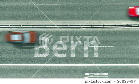 Aerial top down view of the road with cars revealing Bern caption. Car travel in Switzerland 3D Aerial top down view of the road with cars revealing Bern caption. Car travel in Switzerland 3D 56859497