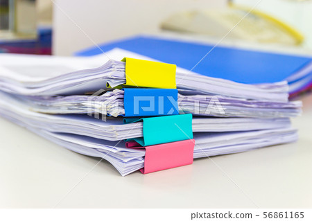 file folder and Stack of business report paper 56861165