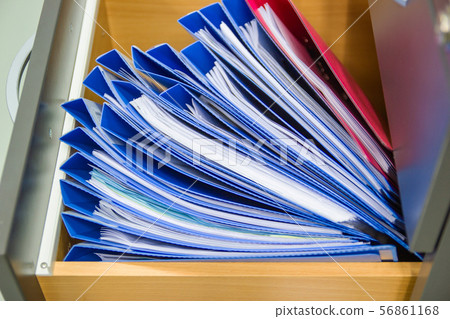 blue file folder documents In a file cabinet 56861168