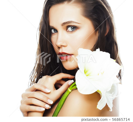 young pretty woman with Amarilis flower close up isolated on white, hands manicure, spa people young pretty woman with Amarilis flower close up isolated on white, hands manicure, spa people 56865714