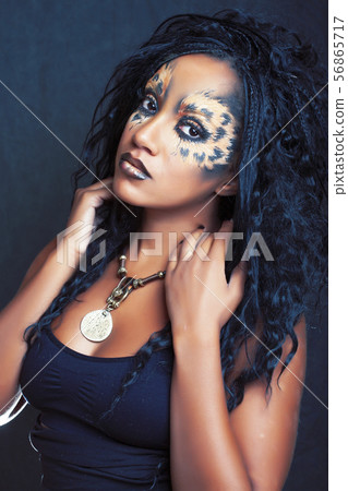 beauty afro girl with cat make up, creative leopard print closeup, fashion style halloween look beauty afro girl with cat make up, creative leopard print closeup, fashion style halloween look 56865717