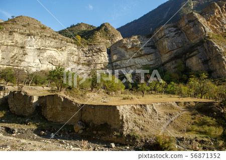 Photo of picturesque mountain terrain blue cloudy sky 56871352