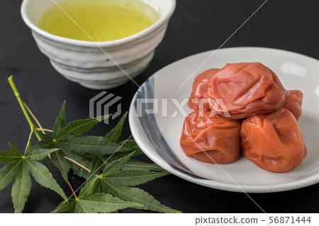 Umeboshi and Japanese tea luxury copy space on black background Umeboshi and Japanese tea luxury copy space on black background 56871444