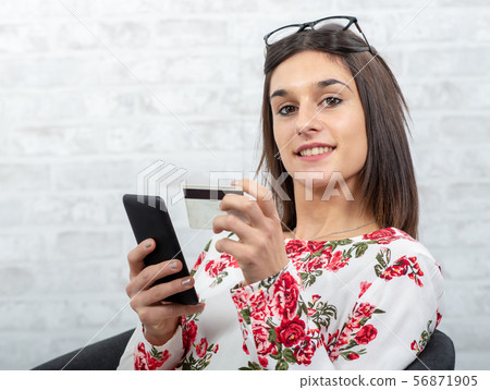 young brunette woman buying with internet 56871905