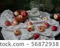 Apple and jug composition 56872938