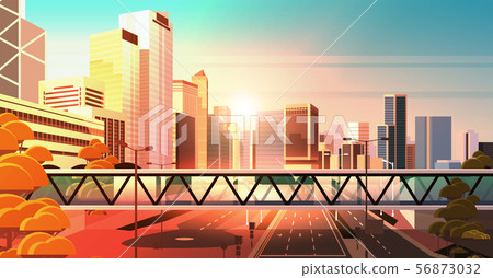 footbridge over highway asphalt road with marking arrows traffic signs city skyline modern footbridge over highway asphalt road with marking arrows traffic signs city skyline modern 56873032