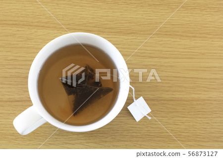 Making tea from tea bags 56873127