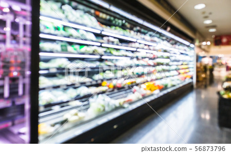 Blurred modern retail supermarket aisle shelves Blurred modern retail supermarket aisle shelves 56873796
