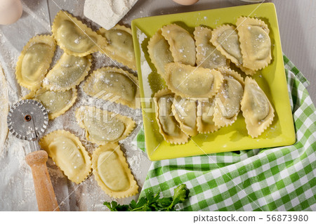 traditional italian ravioli filled with cheese and traditional italian ravioli filled with cheese and 56873980