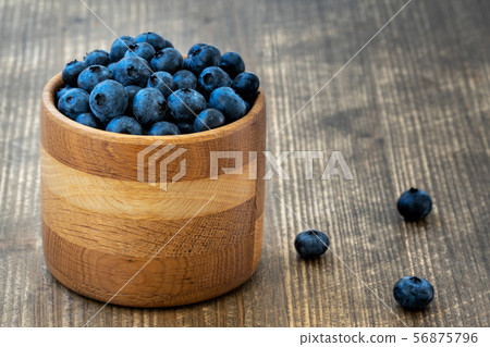 Freshly picked organic blueberries 56875796