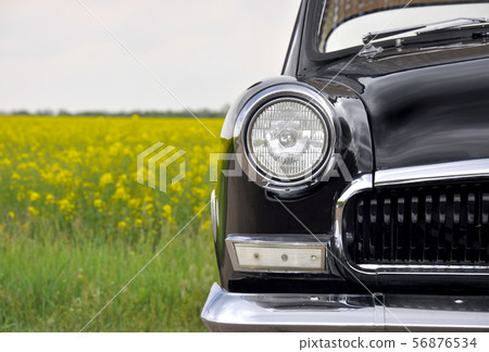 Old vintage black car outdoors Old vintage black car outdoors 56876534