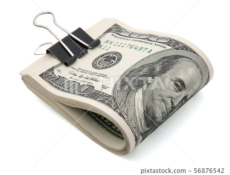 US dollars with clip 56876542
