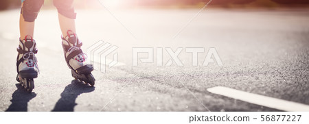 child on roller Skates in the evening 56877227