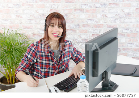 beautiful young support phone operator with 56877757