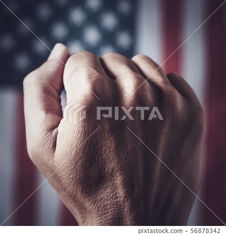 raised fist and american flag raised fist and american flag 56878342