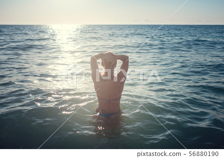 Young beautiful smiling woman with red hair in Young beautiful smiling woman with red hair in 56880190