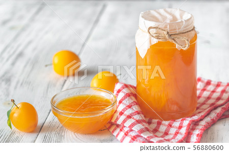 Glass jar of plum jam 56880600