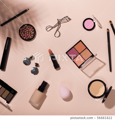 Top view of different makeup beauty cosmetic on pink Top view of different makeup beauty cosmetic on pink 56881822
