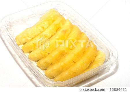 pineapple in a pan cut into slices pineapple in a pan cut into slices 56884431