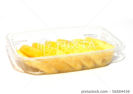 pineapple in a pan cut into slices pineapple in a pan cut into slices 56884436
