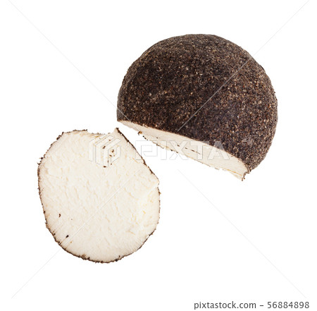 top view of cheese coated by black pepper 56884898