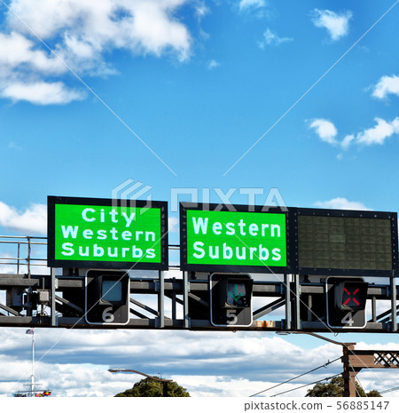 the highway to the city and sign 56885147